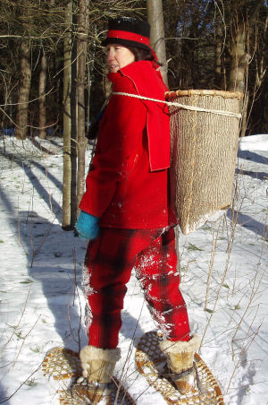 Jennifer Lee in Eastern Woodland dress, with bark backpack